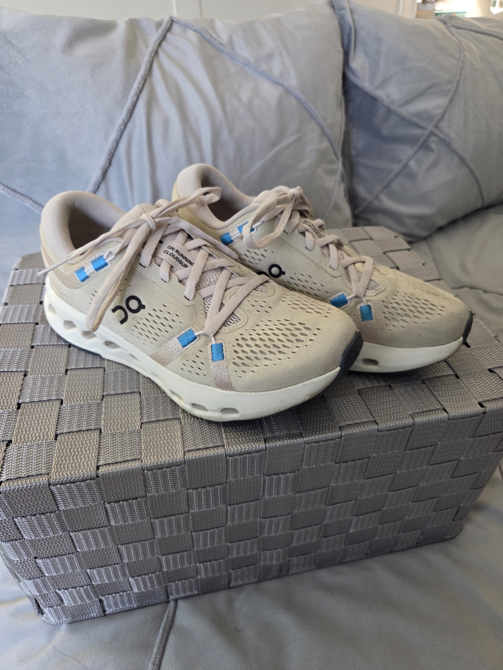 On Running Beige Sneakers with Blue Accents